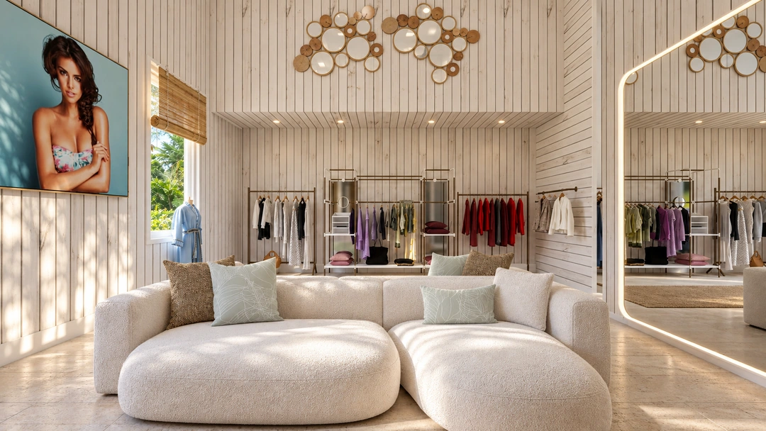 Curved sofa and mirror facing the clothing displays — Miami, FL — Clothing Store, Studio Dalika; project view 8