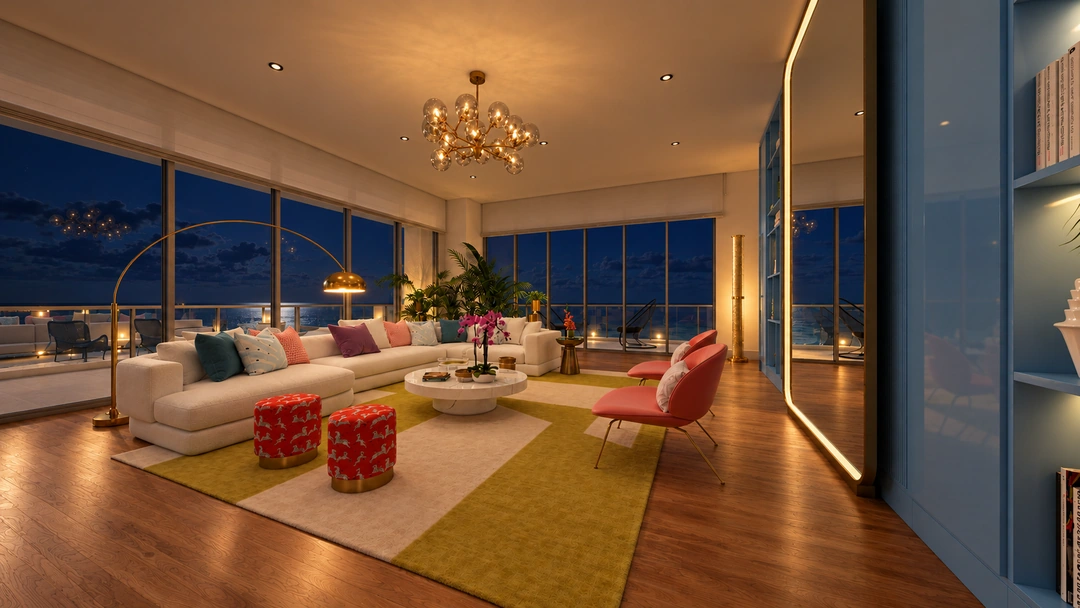 Ocean-facing living room with red chairs at night — Miami, FL — Real Estate, Studio Dalika; project view 7