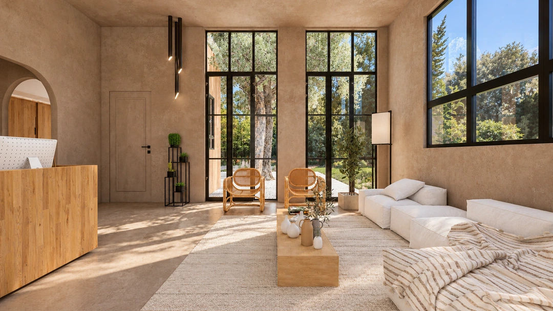 Reception lounge with tall windows and woven chairs — California — Yoga Studio, Studio Dalika; project view 3
