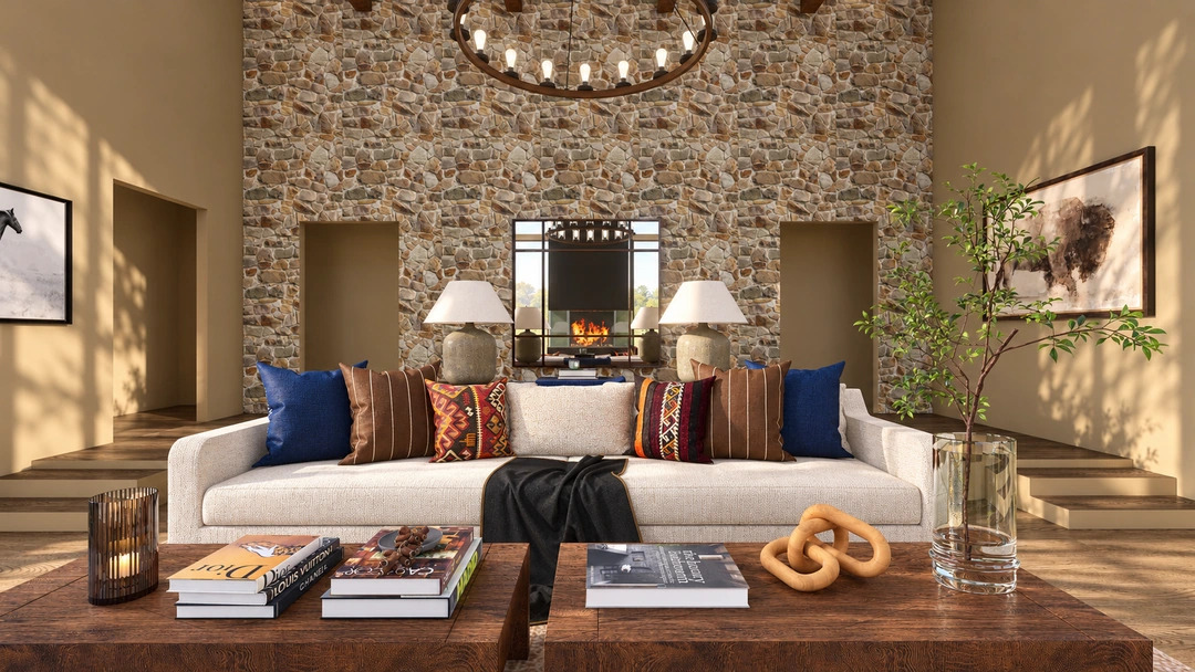 Daylight sofa and patterned cushions against the stone wall — Winter Park, CO — Lodge, Studio Dalika; project view 8