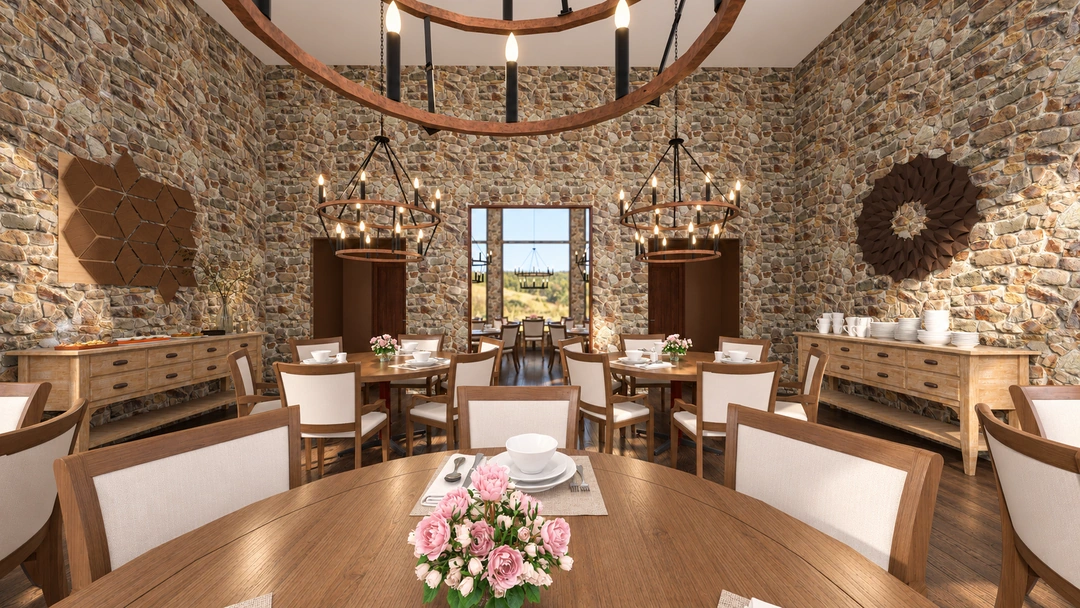 Dining room facing timber doors and a stone wall — Winter Park, CO — Lodge, Studio Dalika; project view 5