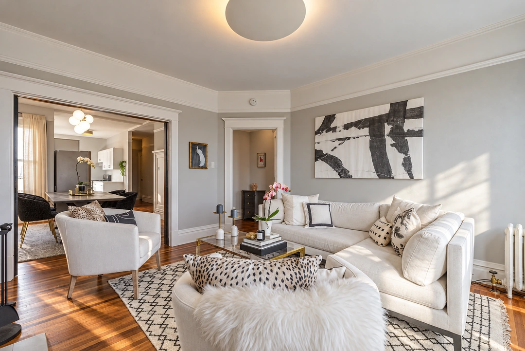 Living room with pale sofas and a light rug — San Francisco, CA, Studio Dalika; project view 4